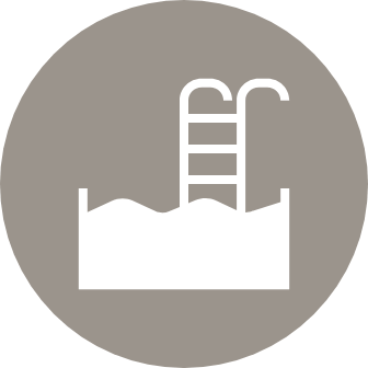 Relax by two pools with resort-style cabanas
